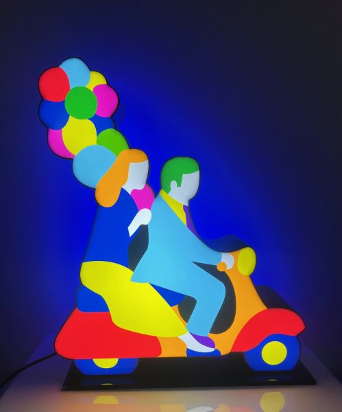 Coppia in Vespa con palloncini
